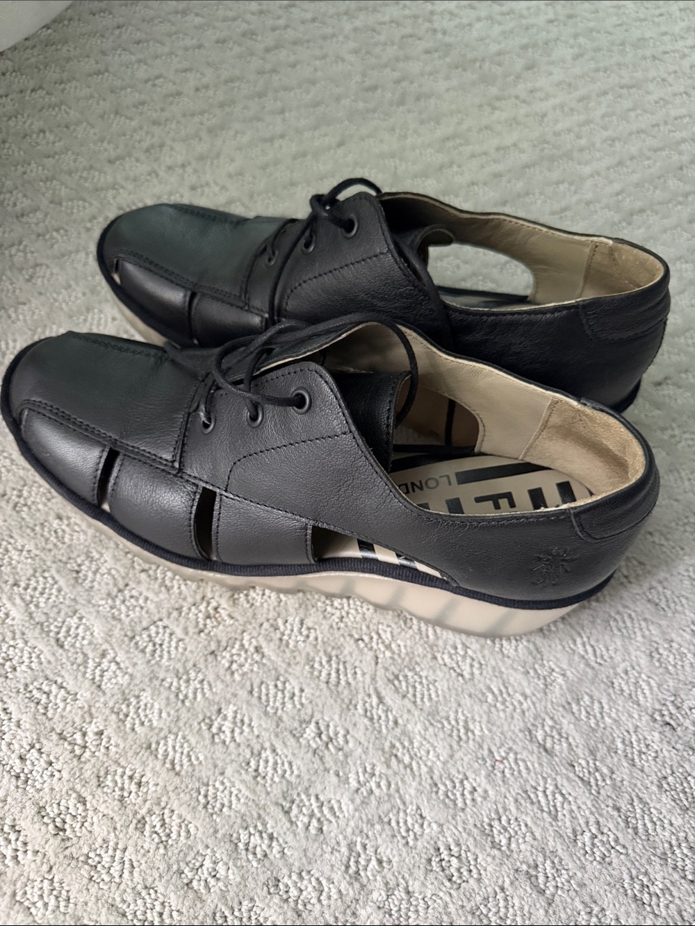 Fly London Black Leather Cutout Slip-On Loafers